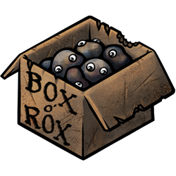 A cardboard box full of pet rocks. Someone has written Box o' Rox on it in black marker.