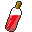 A bottle filled with a red, oily fluid.