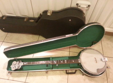 A Merlin 5-string banjo from the 50's. It was a gift from Malone, who stole it back then when trying to learn and ended up giving up. He gave it to Ciaran after seeing the young boy's guitar skill.