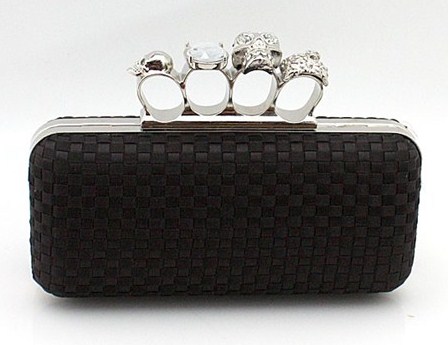 The knuckle duster clutch she carries around.