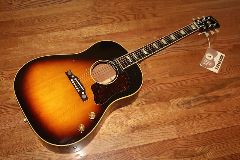 It was his dad's. Its a Gibson J160-E.