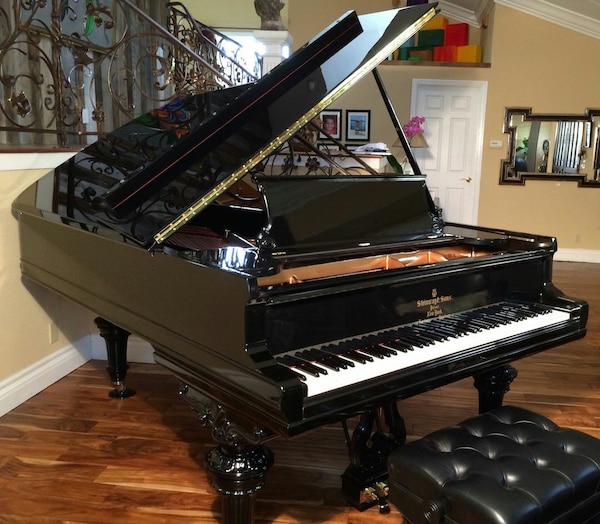 A Steinway and sons grand piano. He bought it when he was 23.