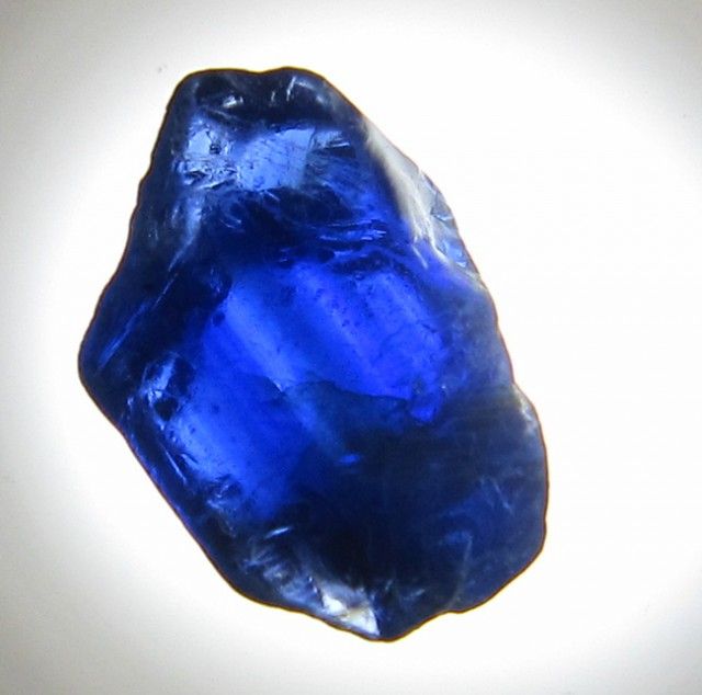 This stone (Sapphire) would be cut, enchanted, and then slotted into the dragon's eye. (See pt. 2)(Credit to the Artist)