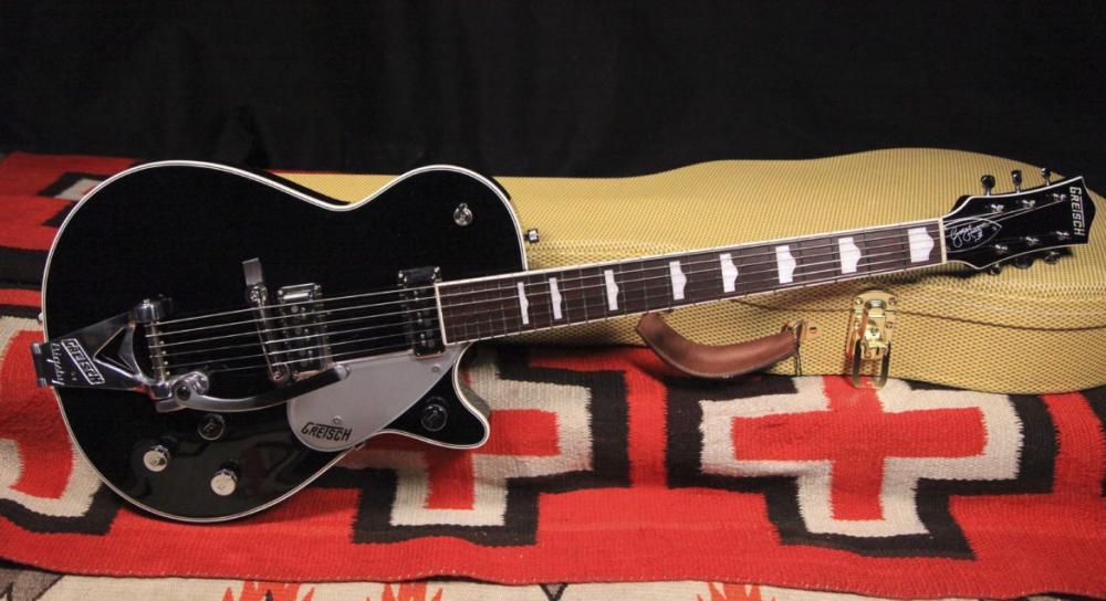 A 1957 Gretsch duo jet named Bette. She's played a lot. He got her at age 12.