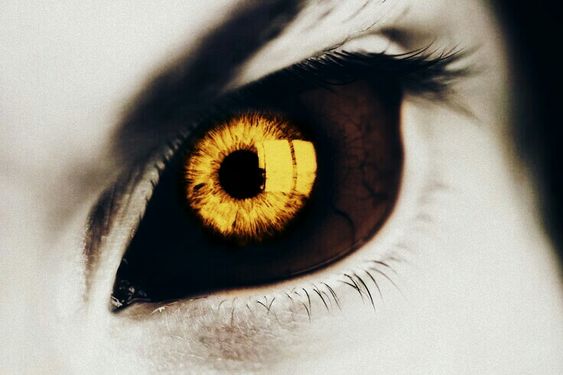 Her eyes turn golden when she is bathed in blood