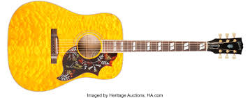 A 1993 Gibson hummingbird named Amanda aka Mandy.