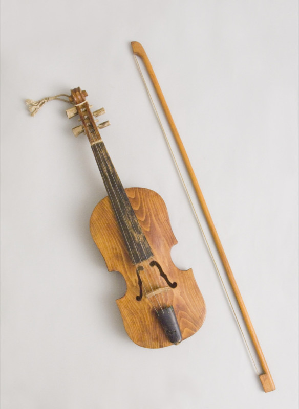 carved of rowan wood. He plays it often.