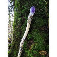 A Birch Staff with a Clear Quatz crystal on the top. It was the first staff Sky's Dad used when he was just starting off.