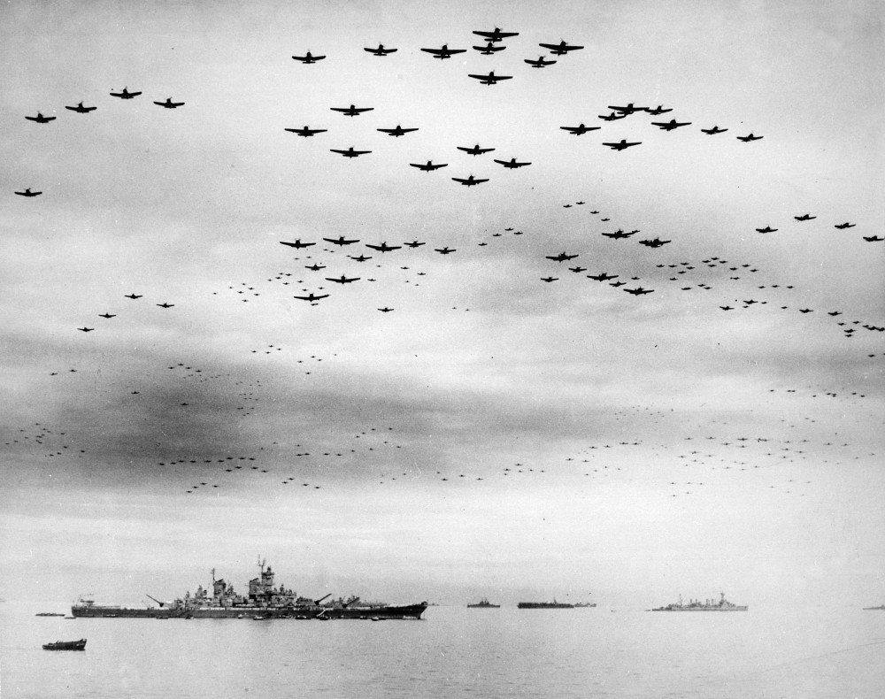 Planes fly in formation over American and British fleets in the Tokyo Bay, Missouri is seen on the left. September 2, 1945