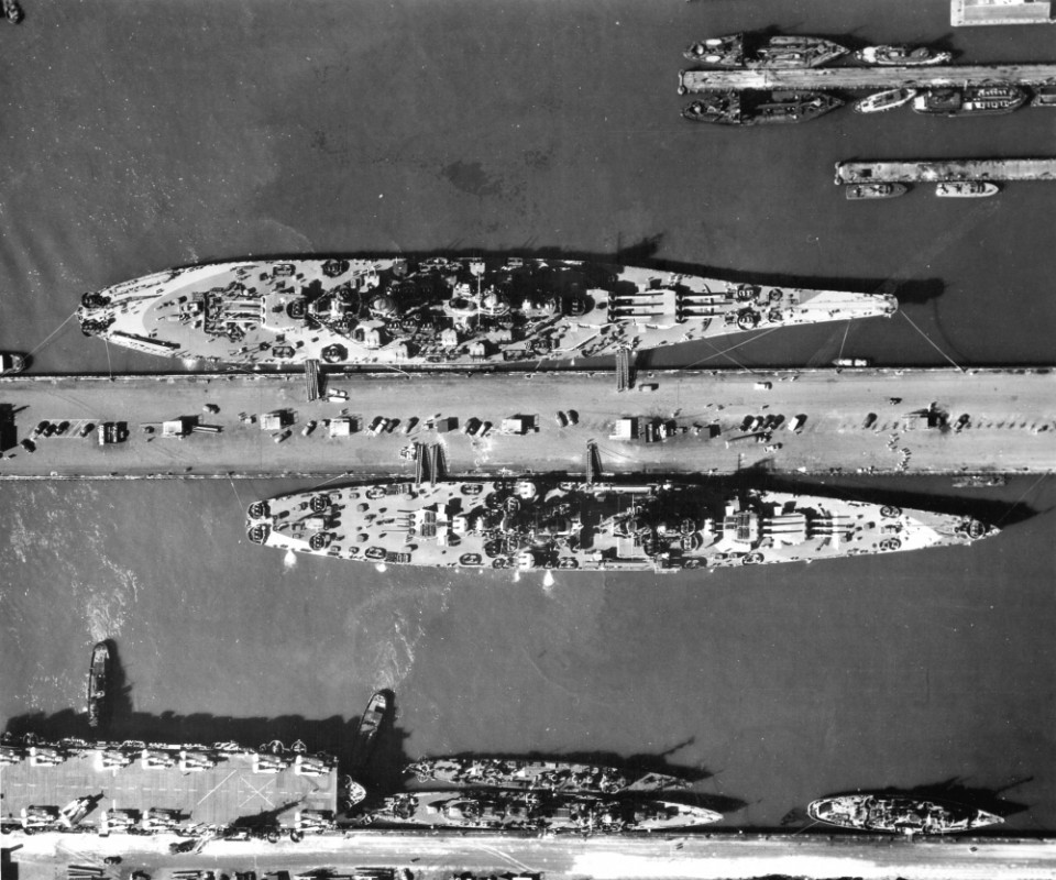 Missouri (BB-63), top, and Alaska (CB-1), bottom, in Norfolk, VA, 1944