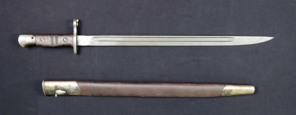 The bayonet of choice for the M1917, the bayonet measures 22 inches long in total, with the blade adding an additional 17 inches to the 43.6 inch long rifle.