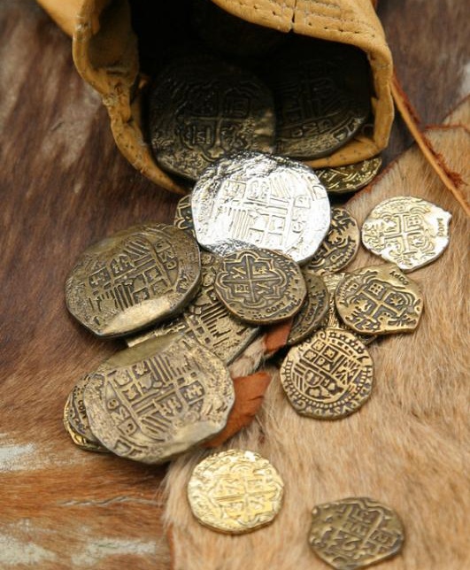 A few gold and silver coins always kept on his person in a small sack tied to his belt on his left hip.