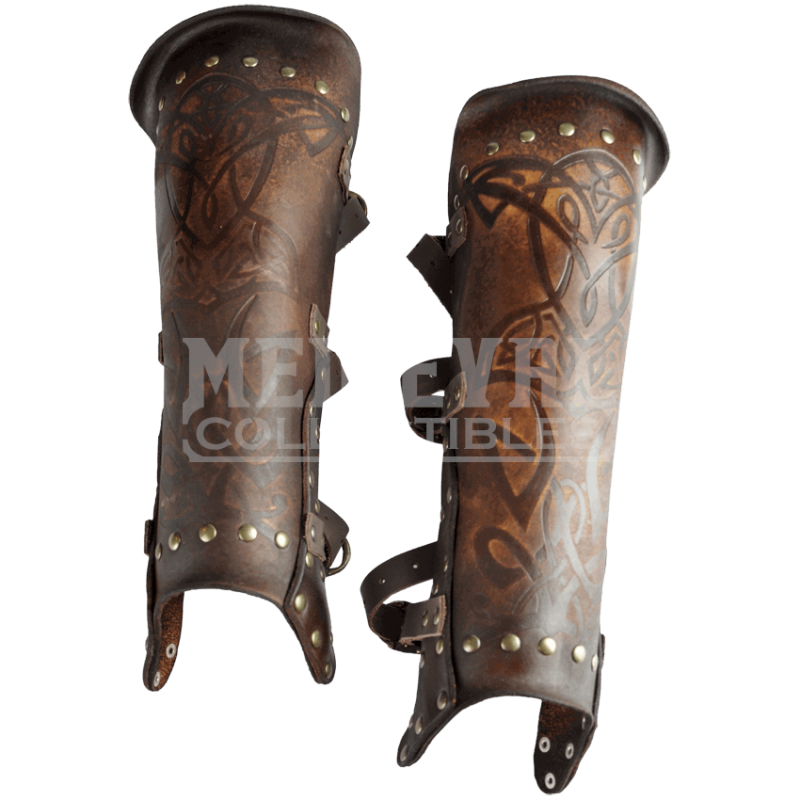 Embossed greaves he wears with his armor.