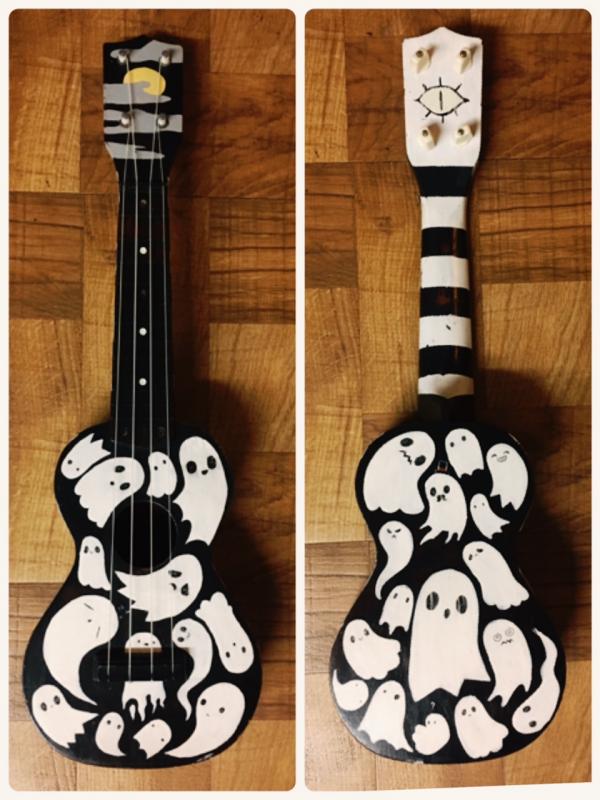 Because I've played him at a larp, his ukulele exists in the real world! The eyes of the ghosts glow in the dark.