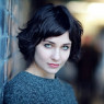 an edited version of a Tuppence Middleton photo to show Marie's appearance.