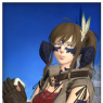 A portrait screenshot. Ilakha looks questioningly to the side while she eats an egg.