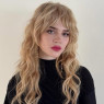 When Vi was a teen she had blonde hair and even some into her adulthood! Many photos can be found with her like this.