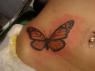 Roni's butterfly tattoo that's located mid-drift along her belly.