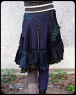 She is very likely to have lace-up skirts like this, though more likely in shades of green or purple, not blue