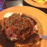 Hot roast beef and gravy open faced sandwich over mashed potatoes or french fries