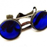 Custom made spectacles to aid her sight on land. Forged of leather and seaglass.