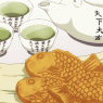 (鯛焼き) is a fish-shaped pancake/waffle type bread.  This is Neko's favorite snack. If you give her one or just even show it, her eyes will sparkle.