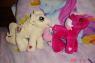 Matching ponies that were won from a crane machine. Ghenna has the pink one, and Seb the white.